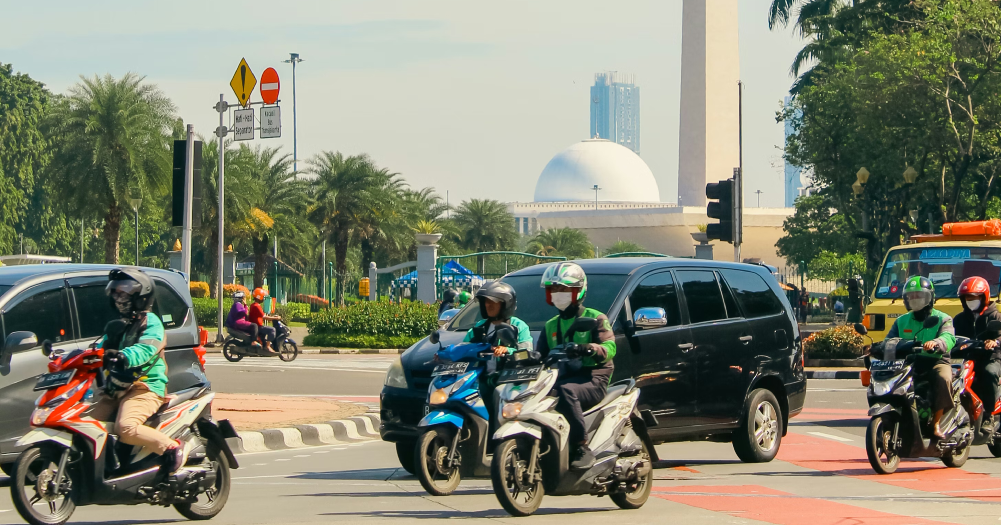 Indonesia to cut ride-hailing firms' max commissions from 20% to 8%
