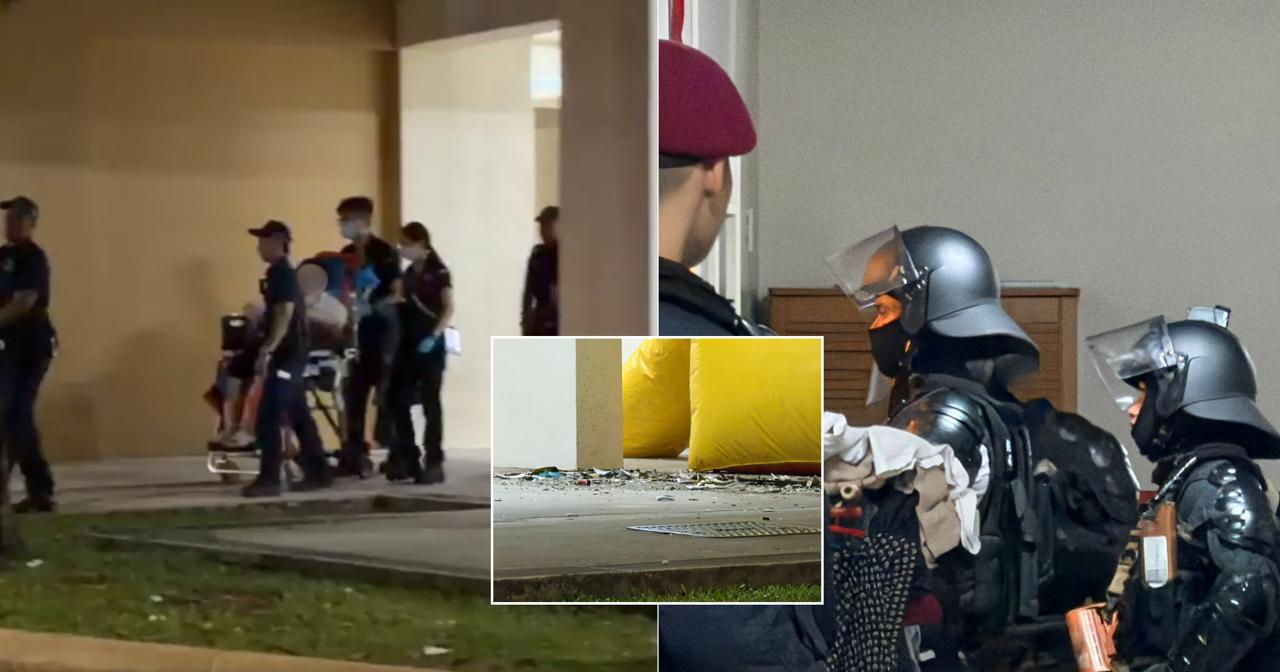 Man, 23, arrested after 5-hour stand-off in Woodlands, seen throwing glass bottles from 2nd floor unit