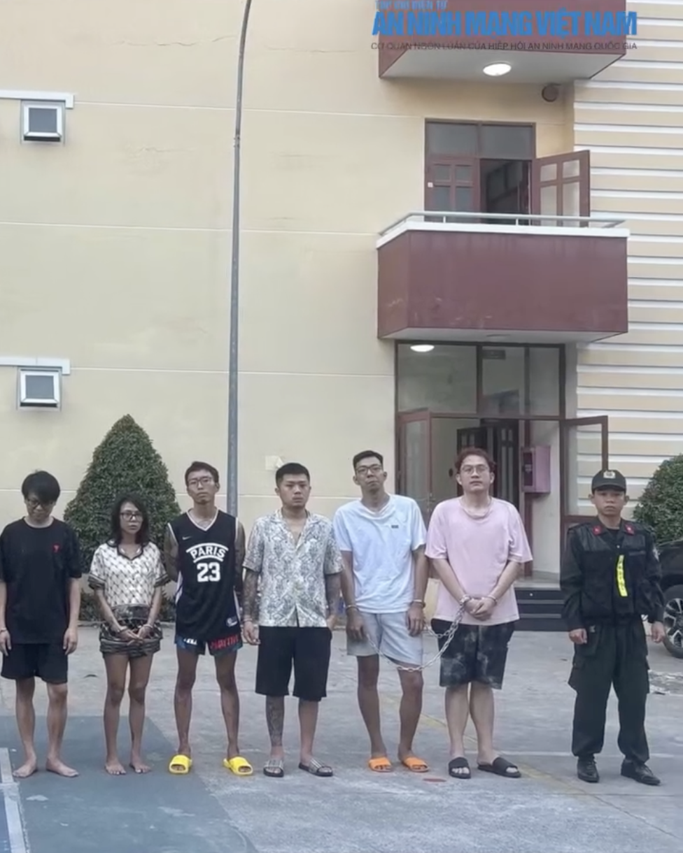 Oh Jiang Fong seen in the custody of police in Vietnam