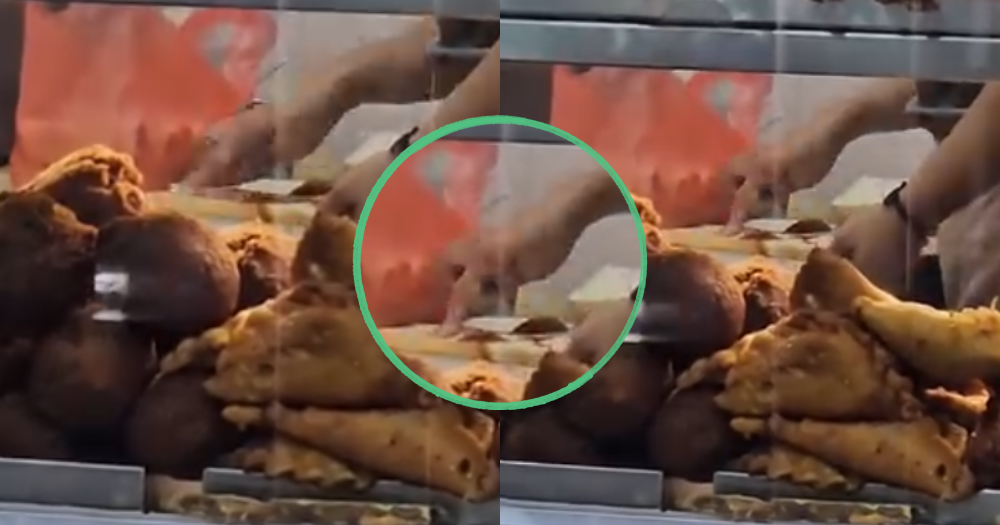Woodlands food stall staff appears to spread butter on bread with finger, SFA investigating - Mothership